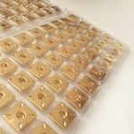 Кнопка пришивна квадратна 2х2см Золото