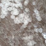 Мереживна тканина "Riddle" з великими, прозорими паєтками 02 Білий Мереживна тканина "Riddle" з великими, прозорими паєтками 02 Білий